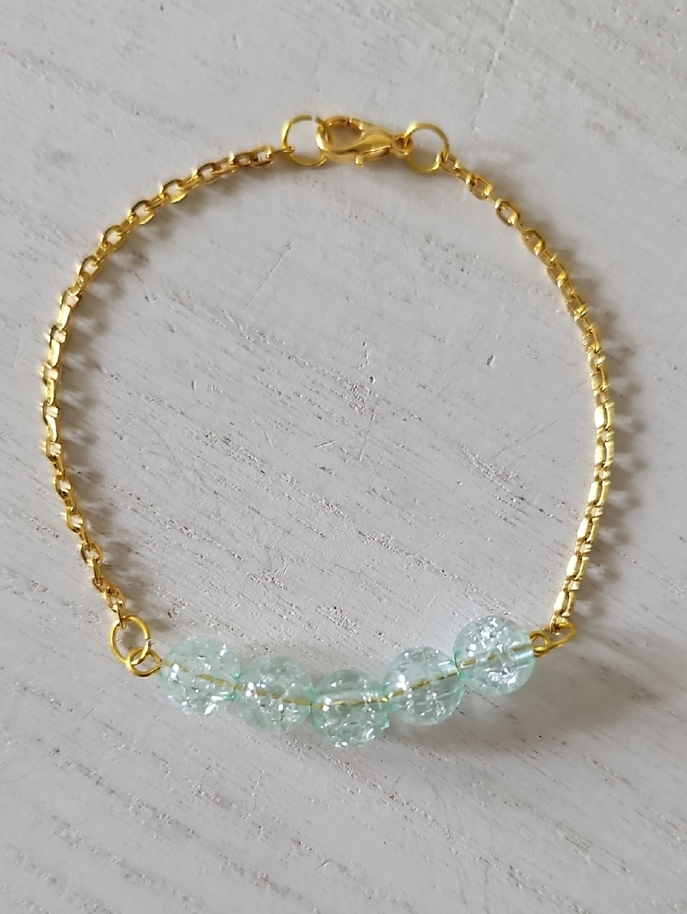 Gold Tone Chain Bracelet with Light Aqua Crackle Beads